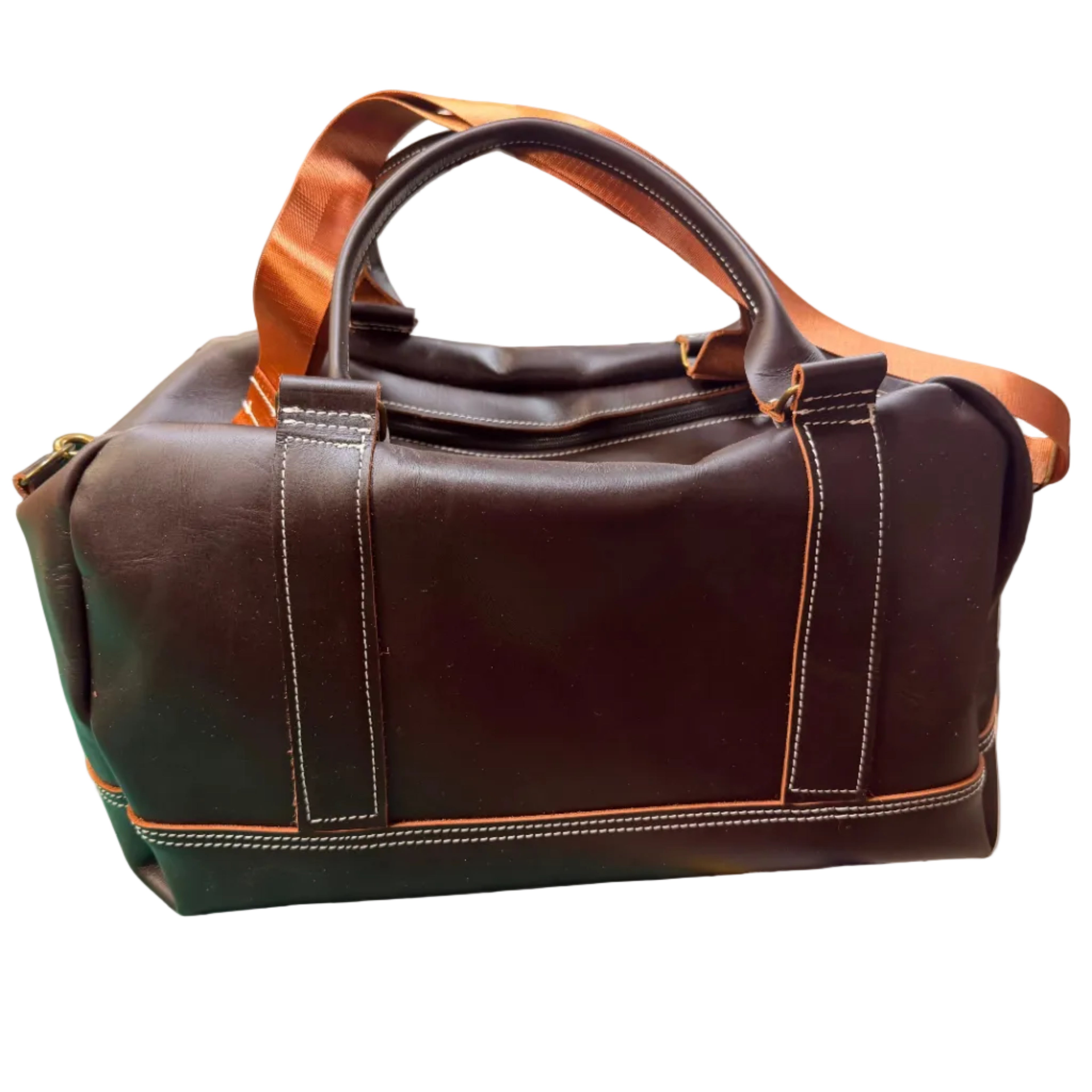 A dark brown leather duffel bag with contrasting light brown leather handles.