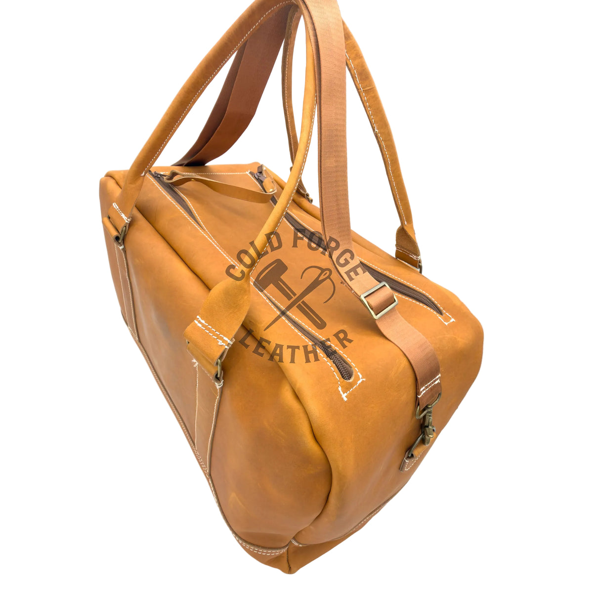 A tan leather duffel bag with double top handles, a zippered main compartment, and a side zipper, photographed on a white reflective studio surface. 
