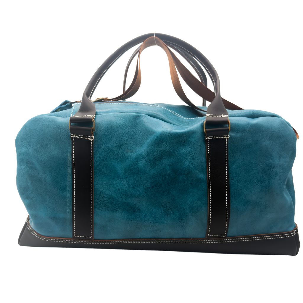 A teal blue leather duffel bag with dark brown leather handles, straps, and base, featuring white contrast stitching.